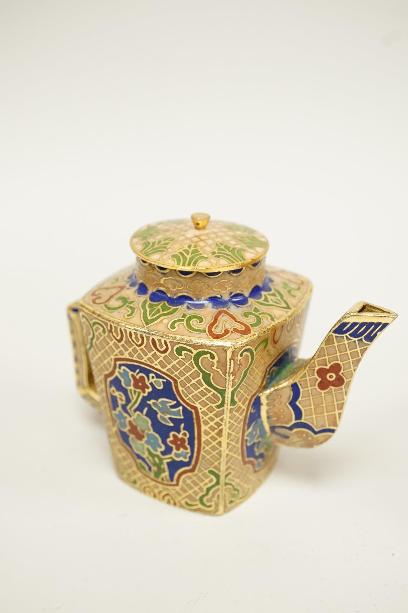 A collection of miniature enamel and cloisonné boxes, eggs and a painted rabbit, etc. (11)